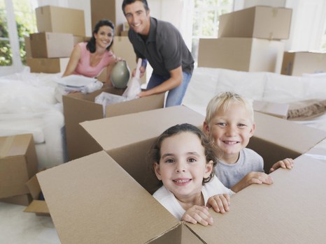 Team planning an office relocation in Balham with boxes and furniture