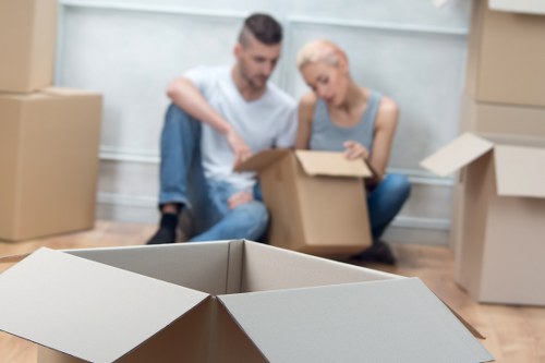 Boxes and luggage prepared for a student move in Balham