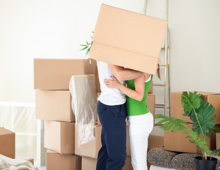 Careful wrapping and labelling of household items during a packing service