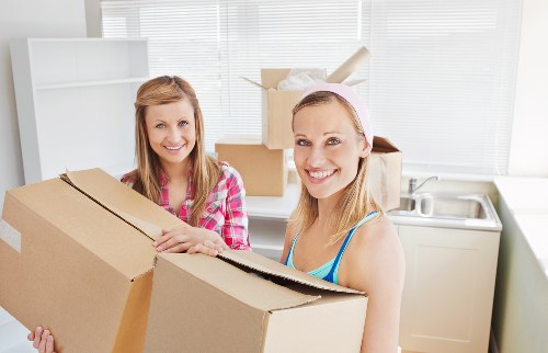 Retail stock and fixtures being moved during a commercial relocation in Balham